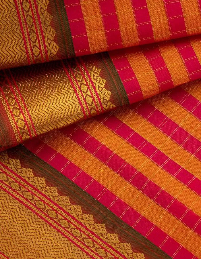 Pink And Orange Checked Pattu Pavada With Zari Border