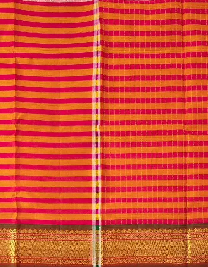 Pink And Orange Checked Pattu Pavada With Zari Border